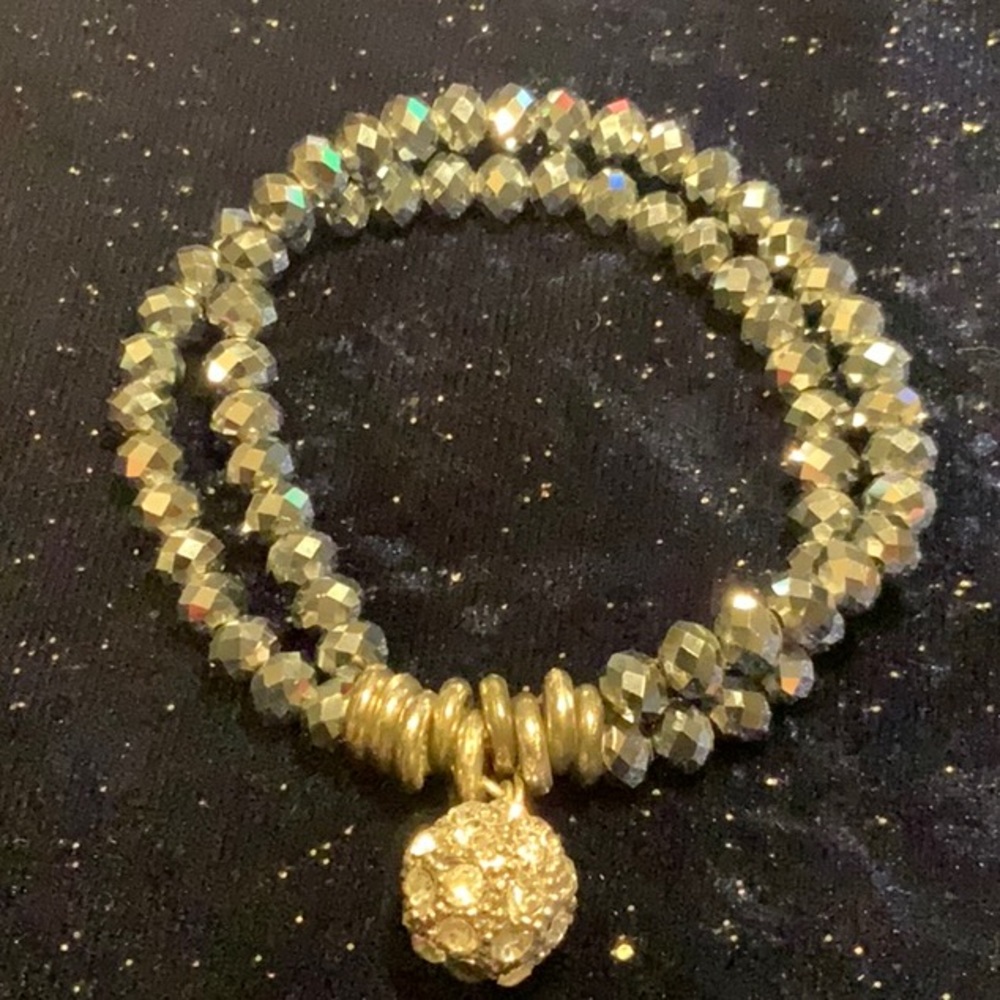 Silver colour double stranded bracelet with crystals in a silver ball